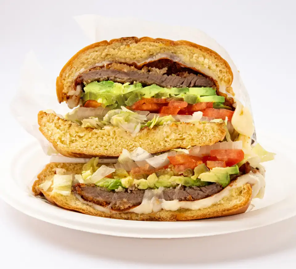 Mexican torta sandwich from the menu at Los Tacos Hermanos on Canal Street in SoHo, NYC