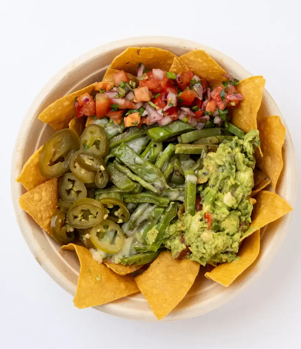 Mexican nachos from the menu at Los Tacos Hermanos on Canal Street in SoHo, NYC
