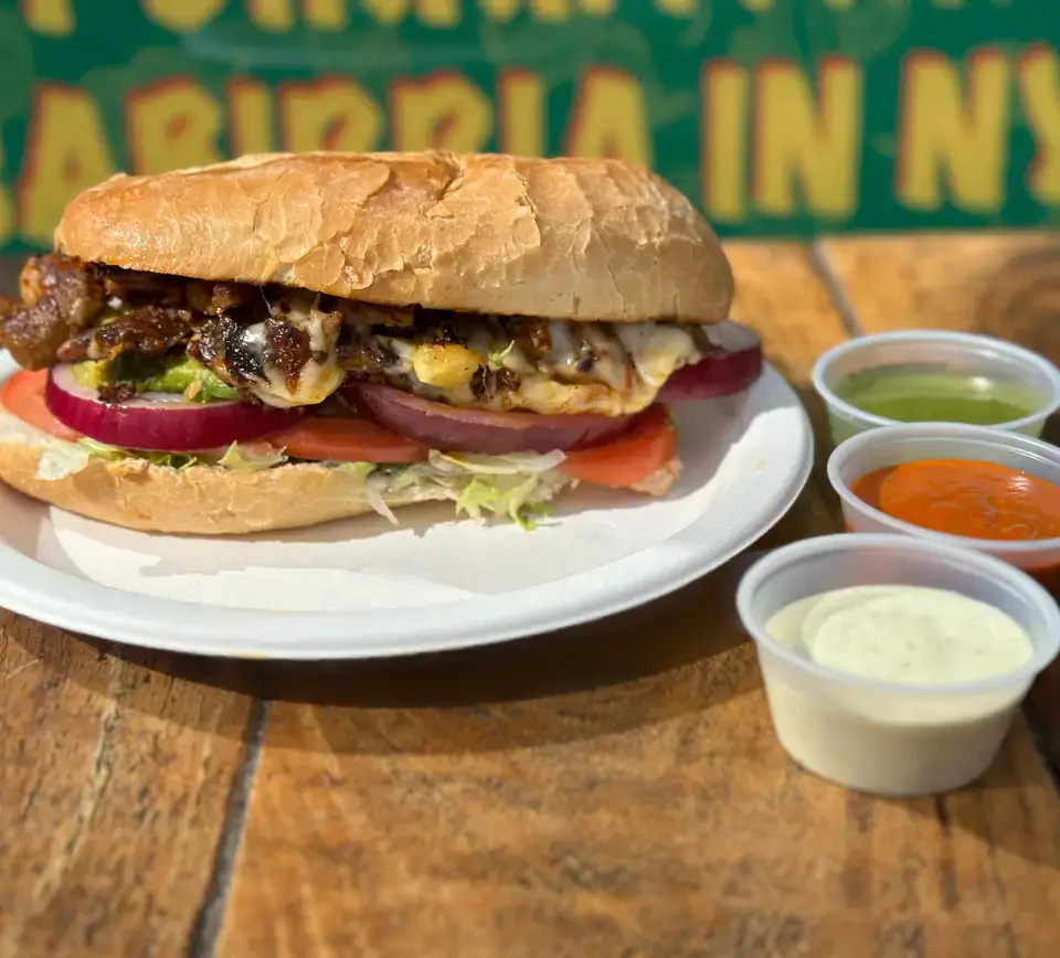 Mexican torta sandwich from the menu at Los Tacos Hermanos on Canal Street in SoHo, NYC