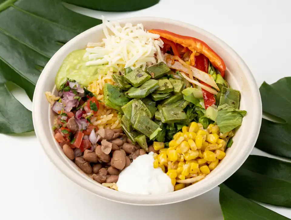 Burrito bowl with rice, beans, corn and greens at Los Tacos Hermanos on Canal Street in SoHo, NYC
