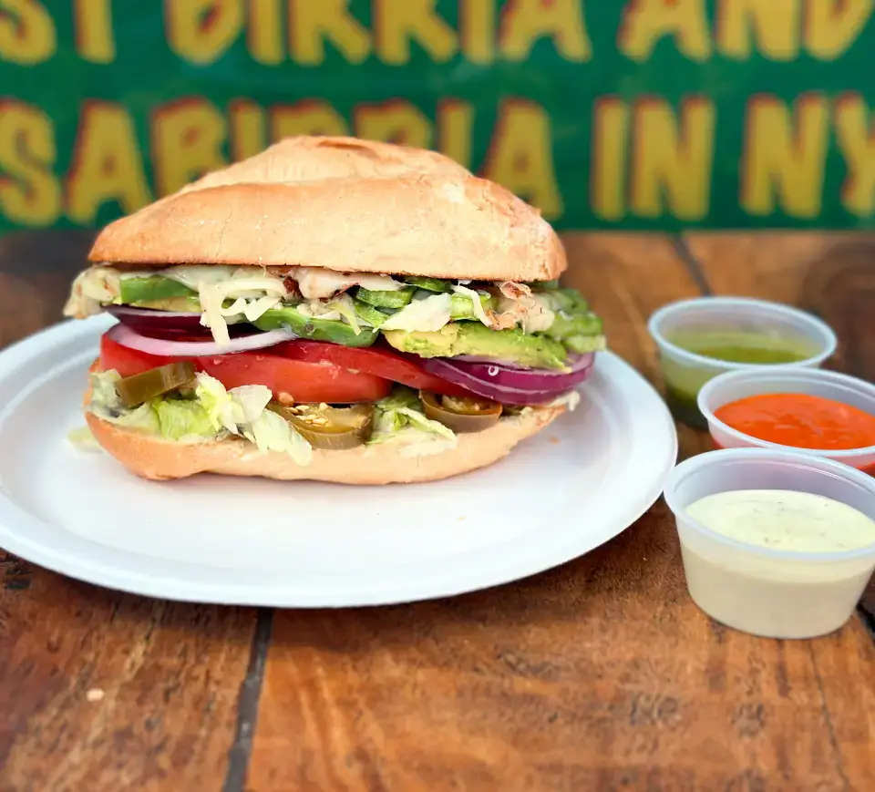 Mexican torta sandwich from the menu at Los Tacos Hermanos on Canal Street in SoHo, NYC